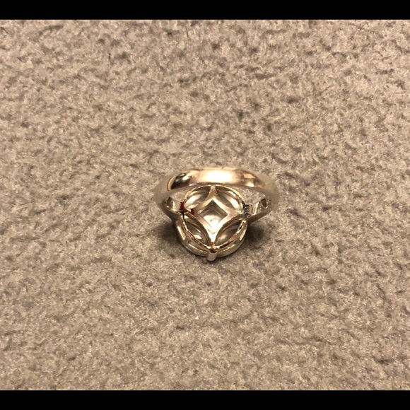 CZ 5 stone ring with silver tone mounting. - Picture 4 of 6